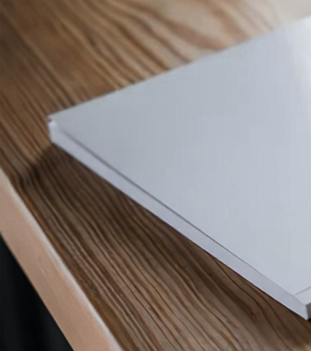 A company profile on a wooden table